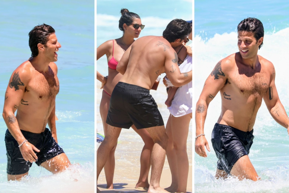 Chay Suede curte a praia em clima de família
