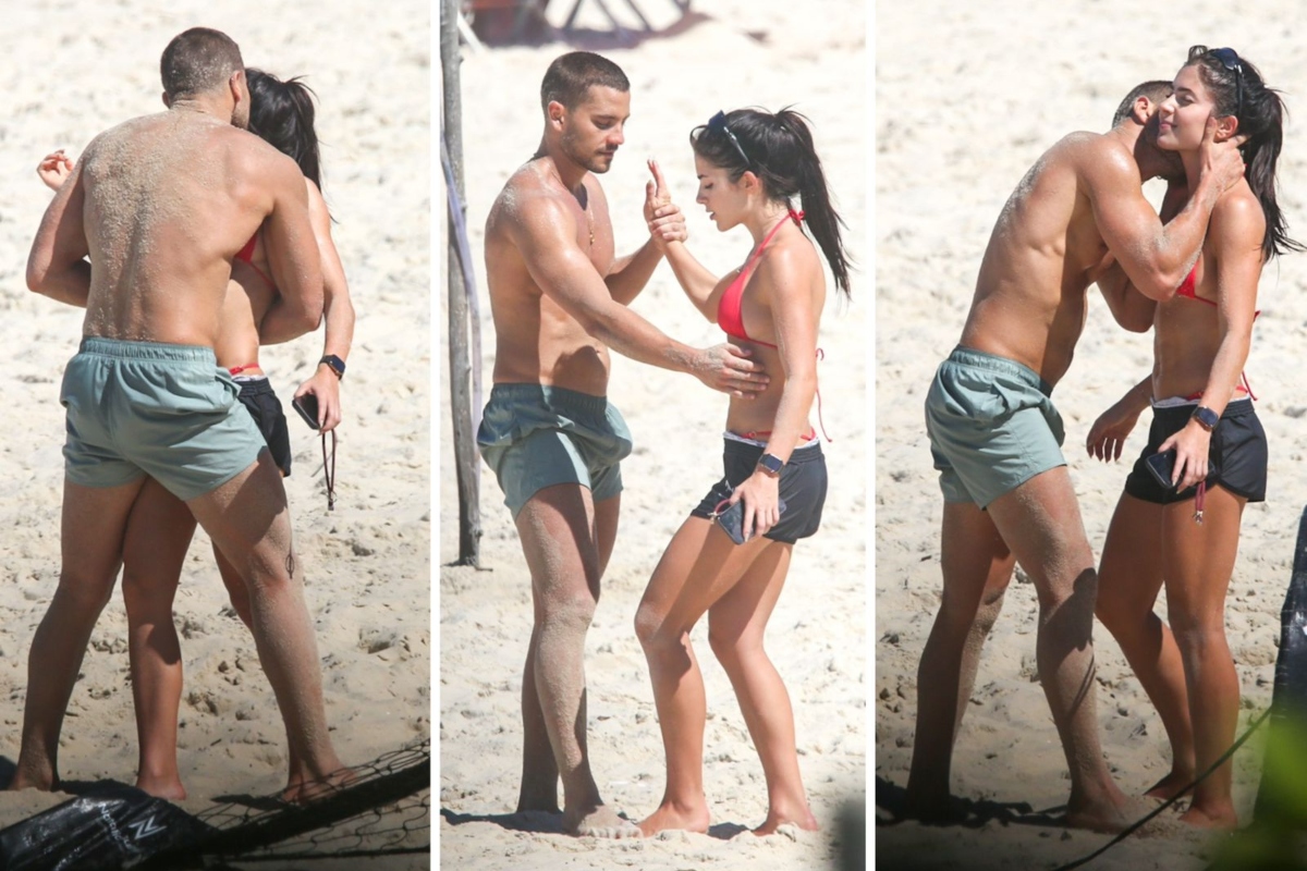 Jade e André trocam carinhos na praia e clima leve chama atenção